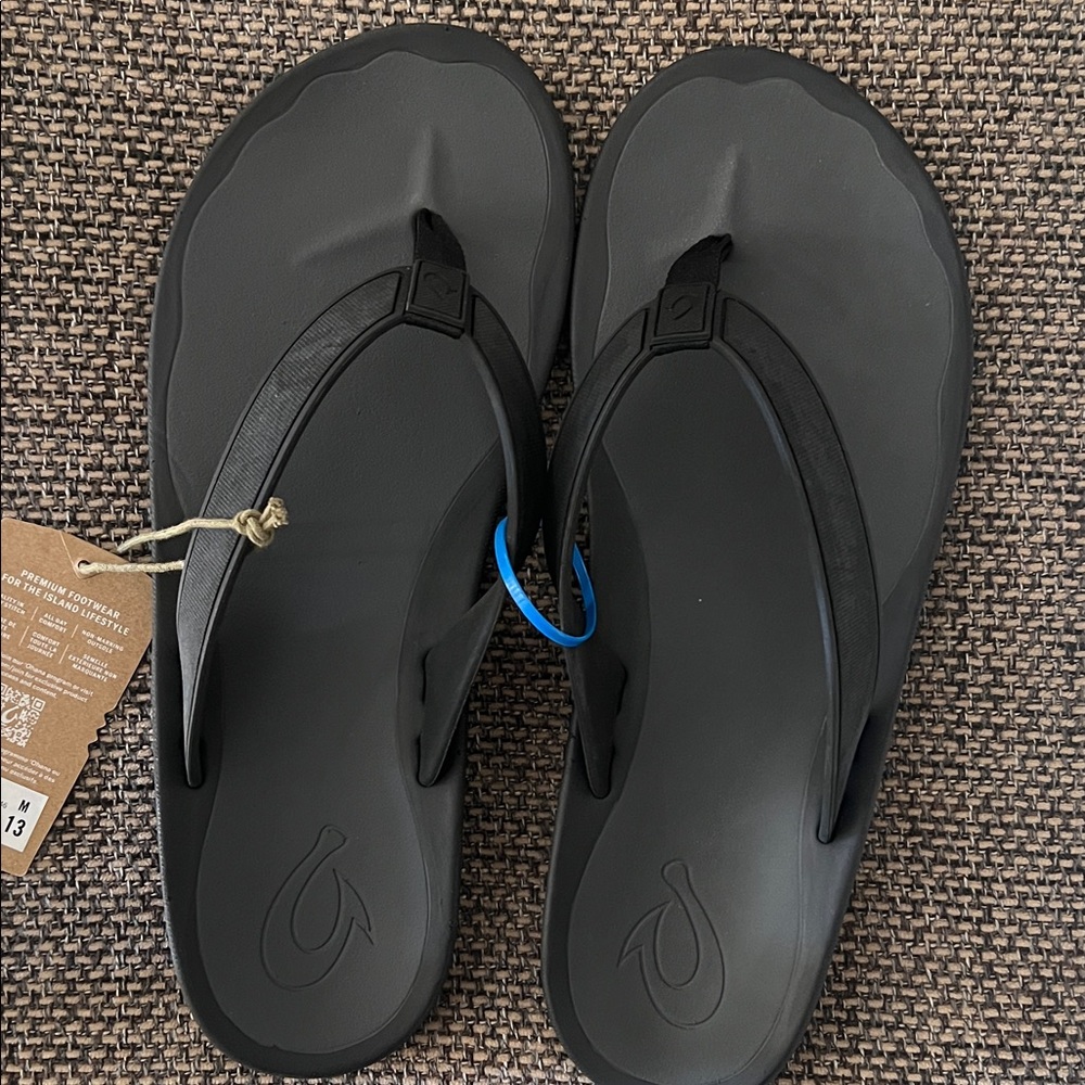 OluKai Brown and Black Flip Flops
